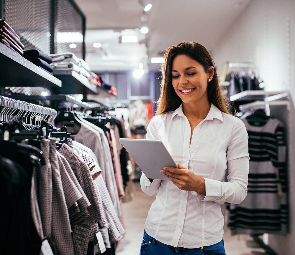 Woman using mobile pos in store